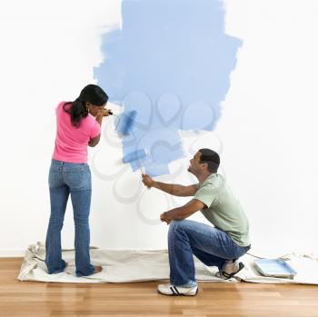 Royalty Free Photo of a Couple Painting Together 