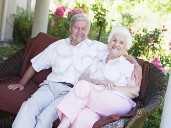 Royalty Free Photo of a Senior Couple Sitting Outdoors
