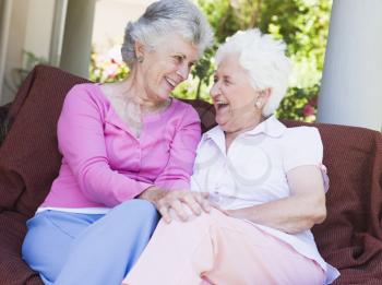 Royalty Free Photo of Two Senior Women Sitting Outside