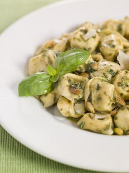 Royalty Free Photo of Tortellini With Pesto and Pine Nuts