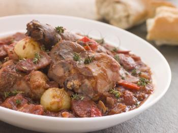 Royalty Free Photo of Rabbit Bread Chorizo Stew with Button Onions