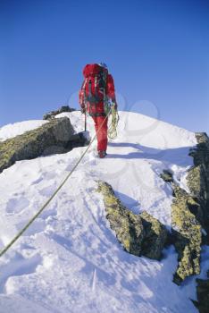 Royalty Free Photo of a Mountain Climber From the Back