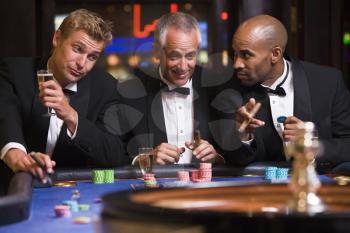 Royalty Free Photo of a Men at a Roulette Table