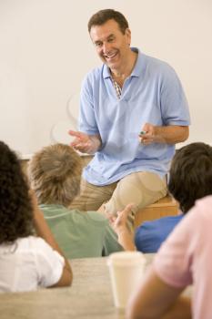 Royalty Free Photo of a Teacher Giving a Lecture