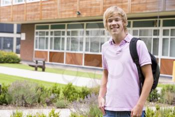 Royalty Free Photo of a Student Standing Outside