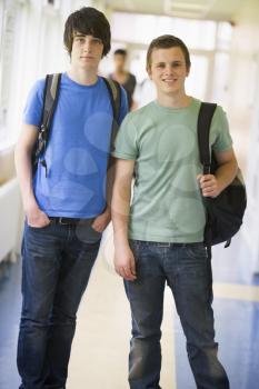 Royalty Free Photo of Two Students in a Corridor