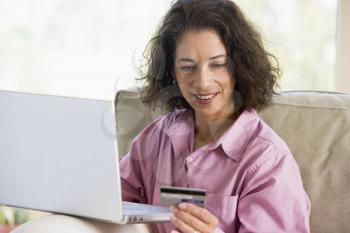 Royalty Free Photo of a Woman Making Online Purchases