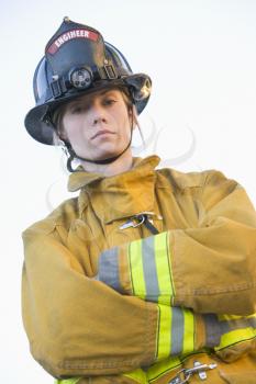 Royalty Free Photo of a Female Firefighter in a Bunker Suit