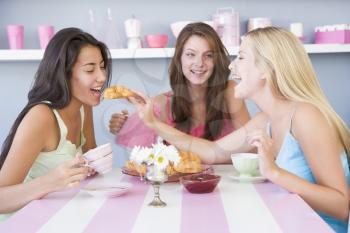 Royalty Free Photo of Three Women Having Tea