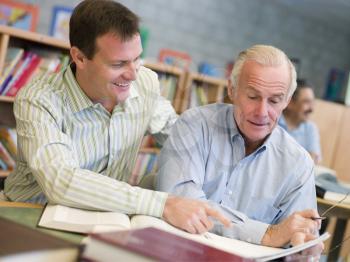 Royalty Free Photo of Two Men in a Library