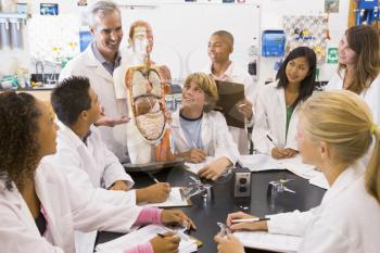 Royalty Free Photo of Students With Their Teacher in Biology Class