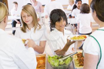 Royalty Free Photo of Kids in a Cafeteria