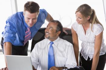 Royalty Free Photo of a Man in the Office With People