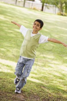 Royalty Free Photo of a Young Boy Outside