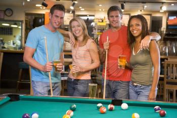 Royalty Free Photo of Friends at a Pool Hall