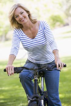 Royalty Free Photo of a Woman on a Bike
