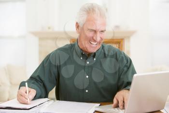 Royalty Free Photo of a Man Doing Paperwork