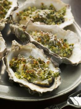 Royalty Free Photo of a Platter of Oysters Rockefeller