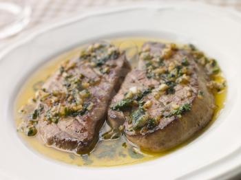 Royalty Free Photo of Foie Gras seared in Garlic Butter