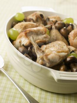 Royalty Free Photo of Fricassee of Chicken  Mushrooms and Grapes