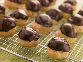 Royalty Free Photo of Chocolate dipped Profiteroles