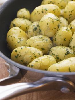Royalty Free Photo of Buttered New Potatoes With Parsley