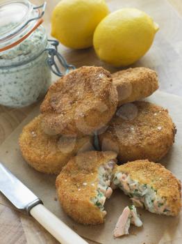 Royalty Free Photo of Cod and Salmon Fish Cakes with Tartar Sauce
