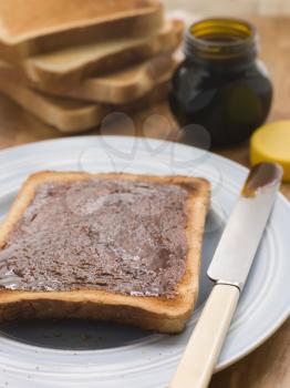 Royalty Free Photo of Slices of Toast With Yeast Extract Spread