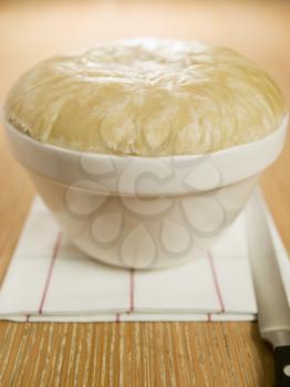 Royalty Free Photo of Steamed Suet Pudding in a Pudding Basin