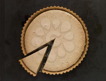 Royalty Free Photo of a Whole Gypsy Tart with a Slice