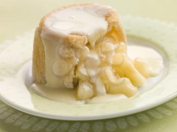 Royalty Free Photo of a Hot Apple Charlotte with Custard