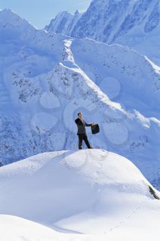 Royalty Free Photo of a Man on a Mountain