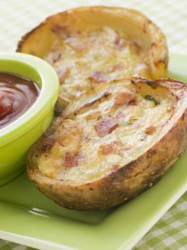 Royalty Free Photo of Ham and Cheddar Cheese Stuffed Potato Skins