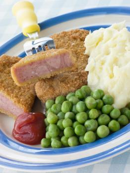 Royalty Free Photo of Breadcrumbed Luncheon Meat With Mashed Potato Peas and Tomato Ketchup