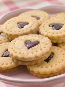 Royalty Free Photo of Jam and Cream Heart Biscuits