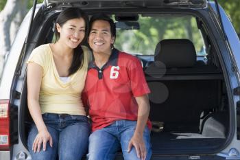 Royalty Free Photo of a Couple in the Back of a Van