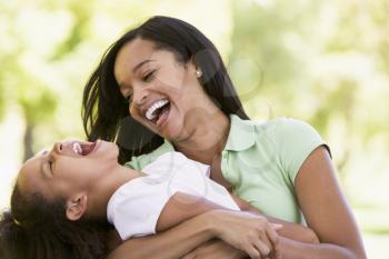 Royalty Free Photo of a Mother and Daughter Laughing