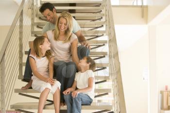 Royalty Free Photo of a Family on a Staircase