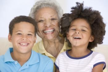 Royalty Free Photo of a Woman With Her Grandchildren