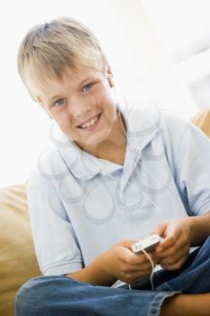 Royalty Free Photo of a Boy With an MP3 Player