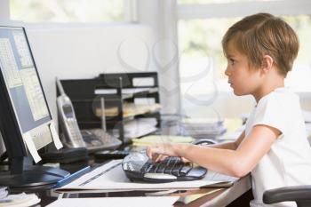 Royalty Free Photo of a Child at the Computer