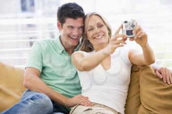 Royalty Free Photo of a Couple With a Digital Camera