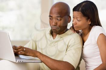 Royalty Free Photo of a Couple With a Laptop