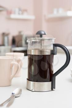 Royalty Free Photo of a Coffee Pot on a Counter