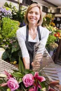 Royalty Free Photo of a Woman in a Flower Shop