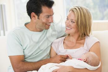 Royalty Free Photo of a Couple With a Baby