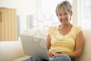 Royalty Free Photo of a Woman With a Laptop