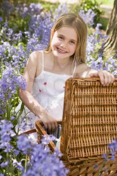 Royalty Free Photo of a Girl With a Picnic Basket