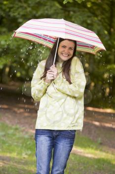 Royalty Free Photo of a Woman in the Rain