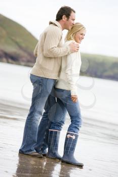 Royalty Free Photo of a Couple Standing on the Beach